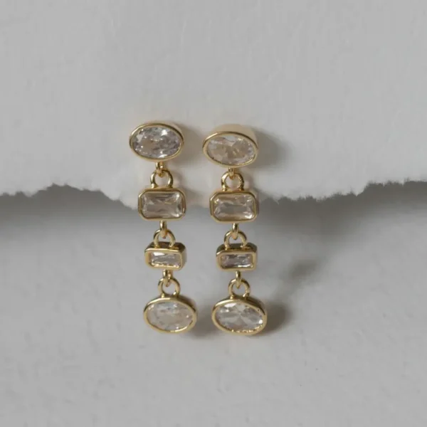 Brinco zircônias geométricas